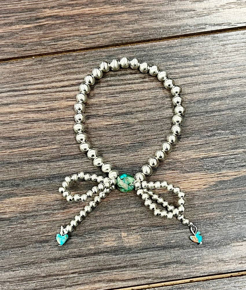 Handmade Silver Navajo Bow Stretch Bracelet