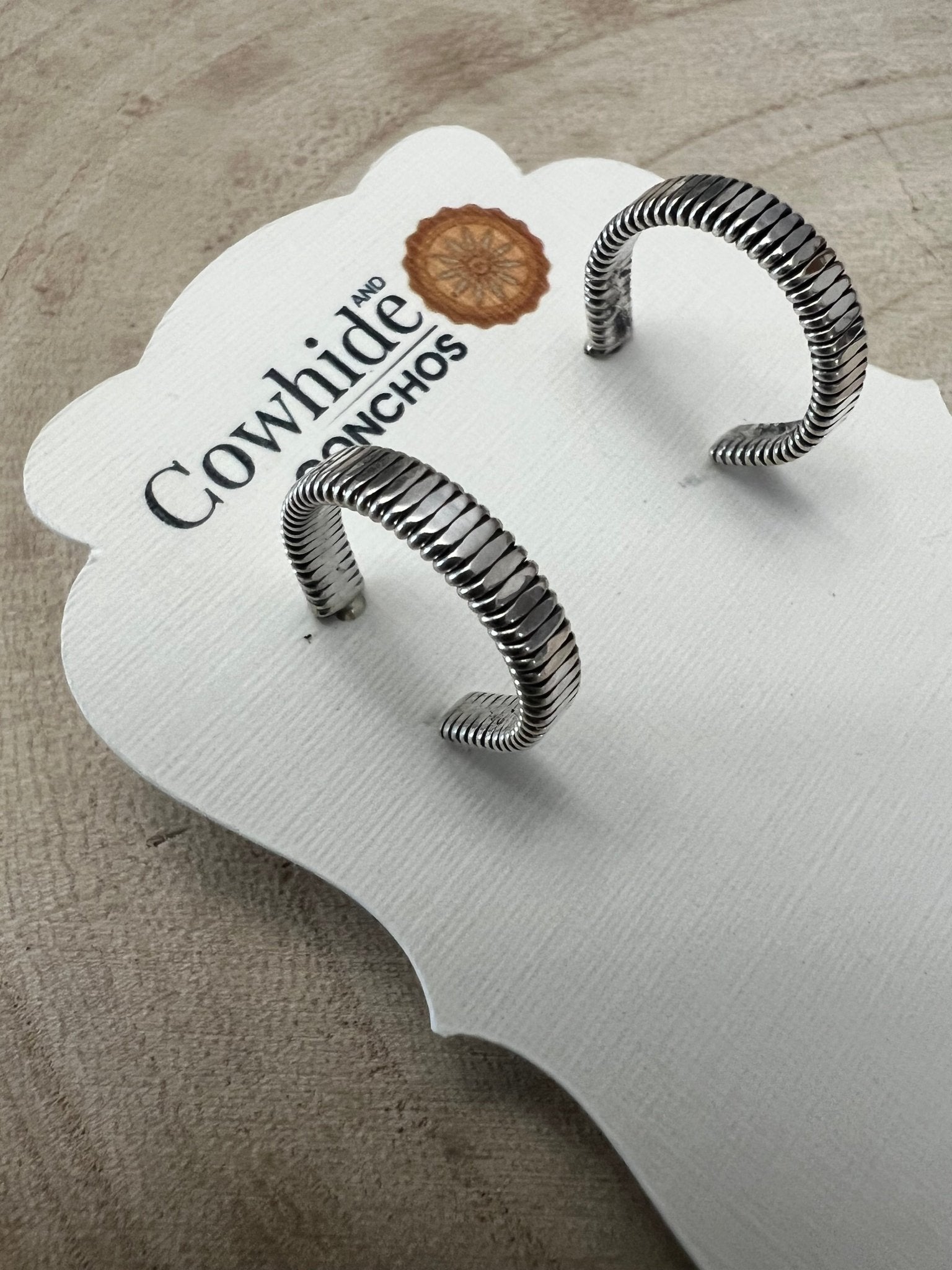 Elaine Tahe Navajo Sterling Silver Hoop Earrings — 5/8" × 1/8" (Listing #1)